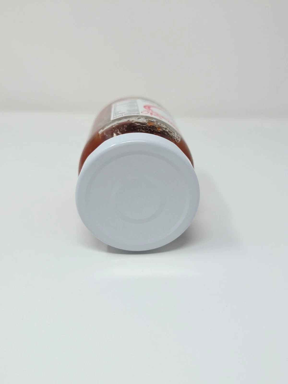 Hell on the Red Hot Party Dip glass jar on a white background