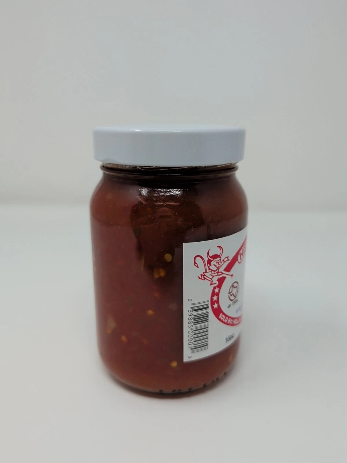 Hell on the Red Hot Party Dip glass jar on a white background