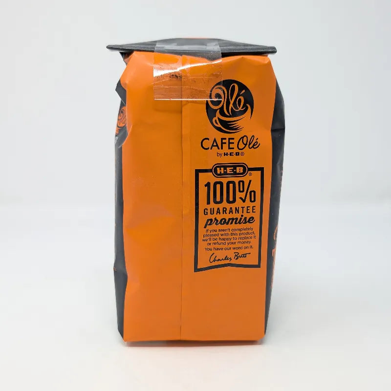 Rear view of a 12 ounce bag of Hub City Blend medium roast ground coffee featuring an orange and black design scheme on a white background.