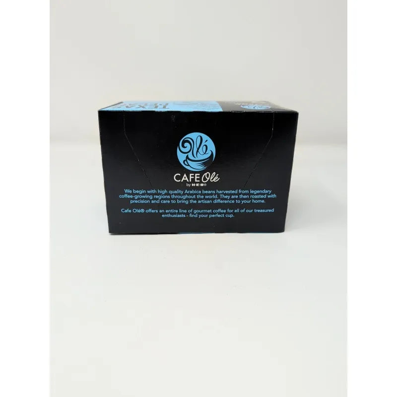 Top view of a 12 count box of Cafe Ole Texas Pecan K-Cups featuring a blue and black design on a plain white background.