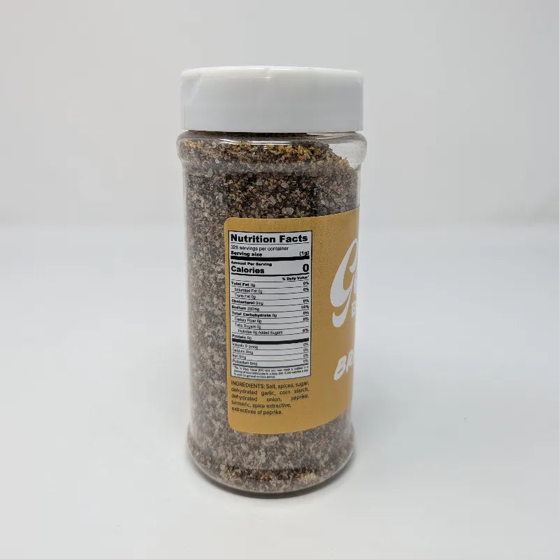 Side view of a shaker of Goldee's Bar-B-Q Brisket Rub featuring ingredients list and Nutrition Facts and a white cap on a white background.