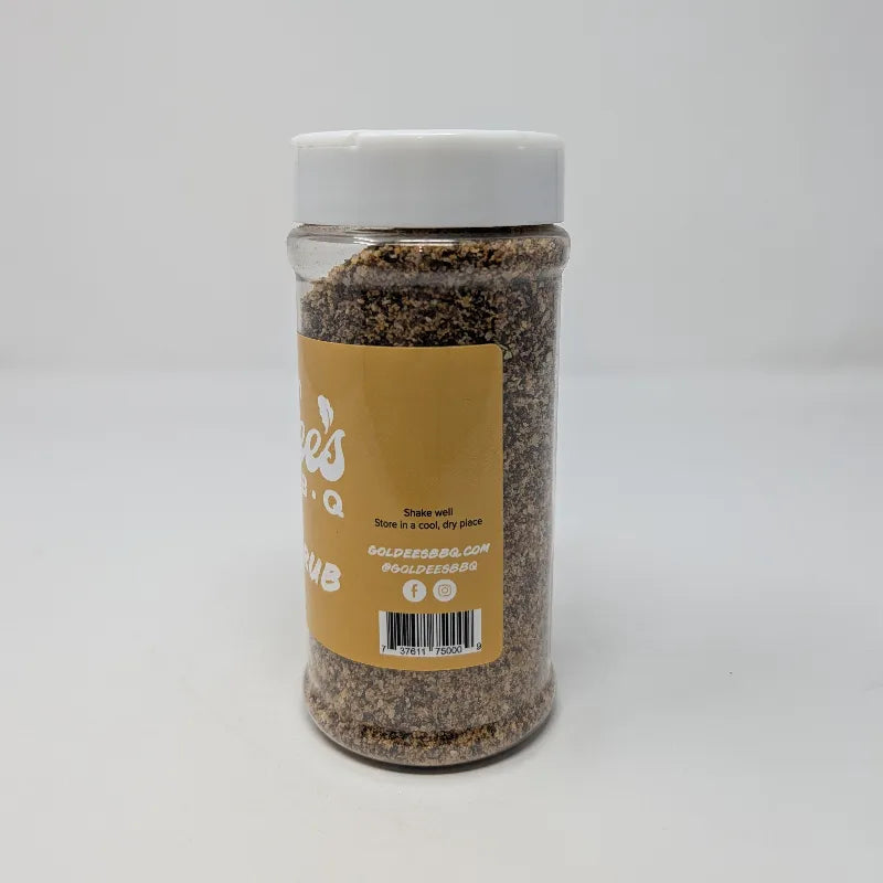 Side view of a shaker of Goldee's Bar-B-Q Brisket Rub  featuring a yellow label with white text and a white cap on a white background.