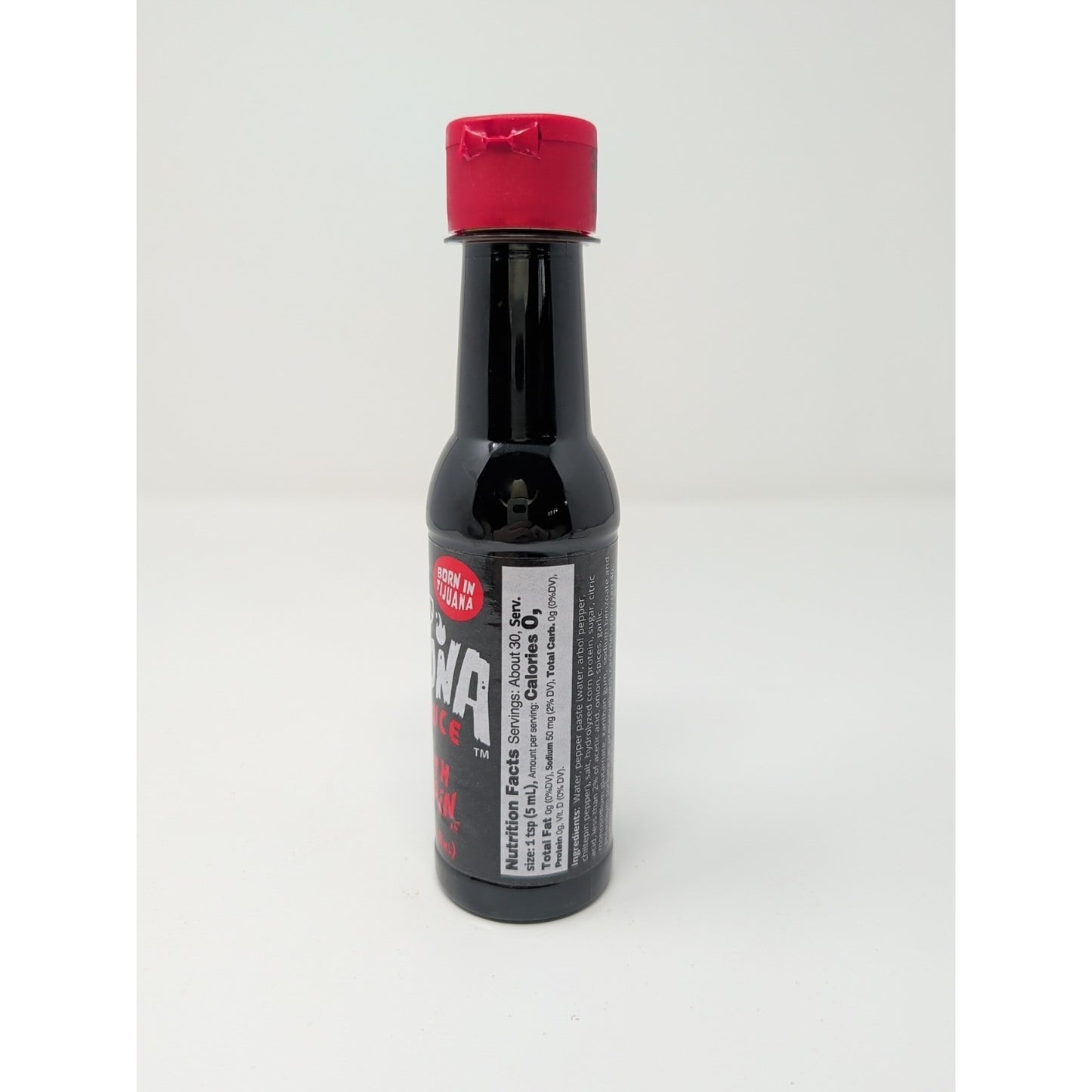 La Perrona Black Hot Sauce with Chiltepin Peppers 5 Ounce Plastic Bottle