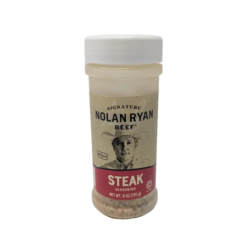 Front view of a 6 oz plastic bottle of Signature Nolan Ryan Beef Steak Seasoning with a white cap and a beige label featuring a Nolan Ryan portrait and 'STEAK' on a red band.