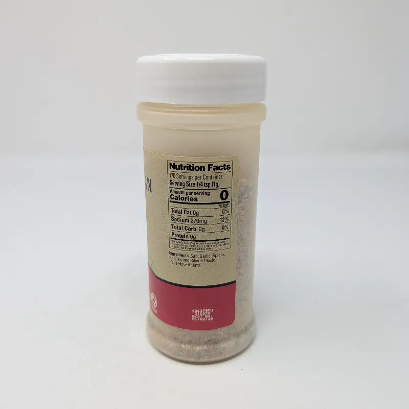 Side view of a 6 oz plastic bottle of Signature Nolan Ryan Beef Steak Seasoning with a white cap and a beige label featuring Nutrition Facts and an ingredients list.