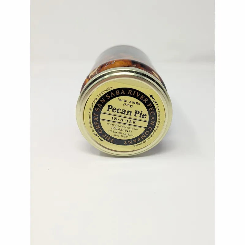 Lid of The Great San Saba River Pecan Company Pecan Pie In A Jar on white background