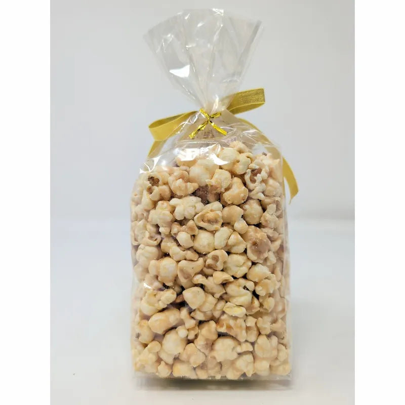 back view of bag of Poppin Pecan Snack on white background