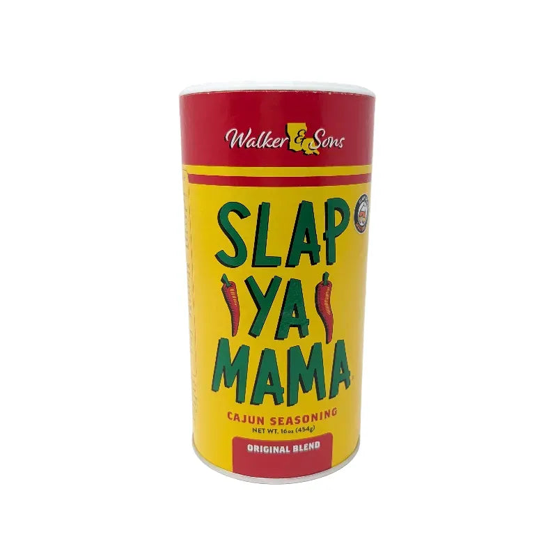 Front view of a 16 ounce shaker container of Slap Ya Mama seasoning featuring red and yellow label with Slap Ya Mama written in green text on a white background.