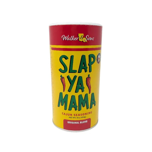 Front view of a 16 ounce shaker container of Slap Ya Mama seasoning featuring red and yellow label with Slap Ya Mama written in green text on a white background.