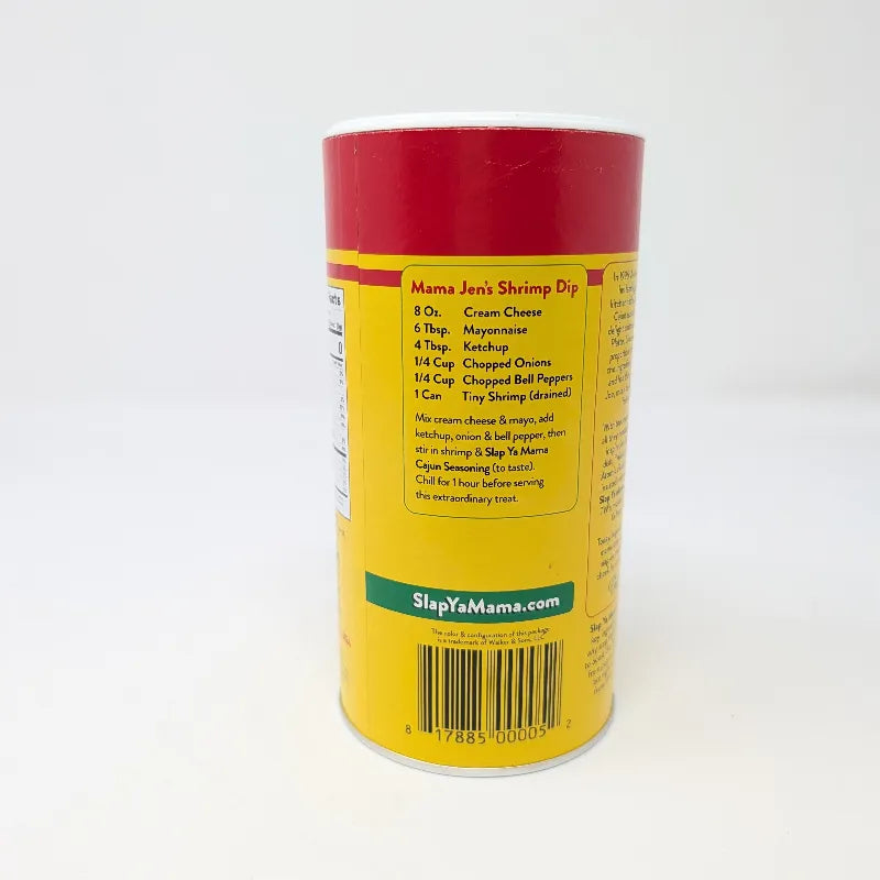 Side view of a 16 ounce shaker container of Slap Ya Mama seasoning featuring red and yellow label with a recipe on a white background.