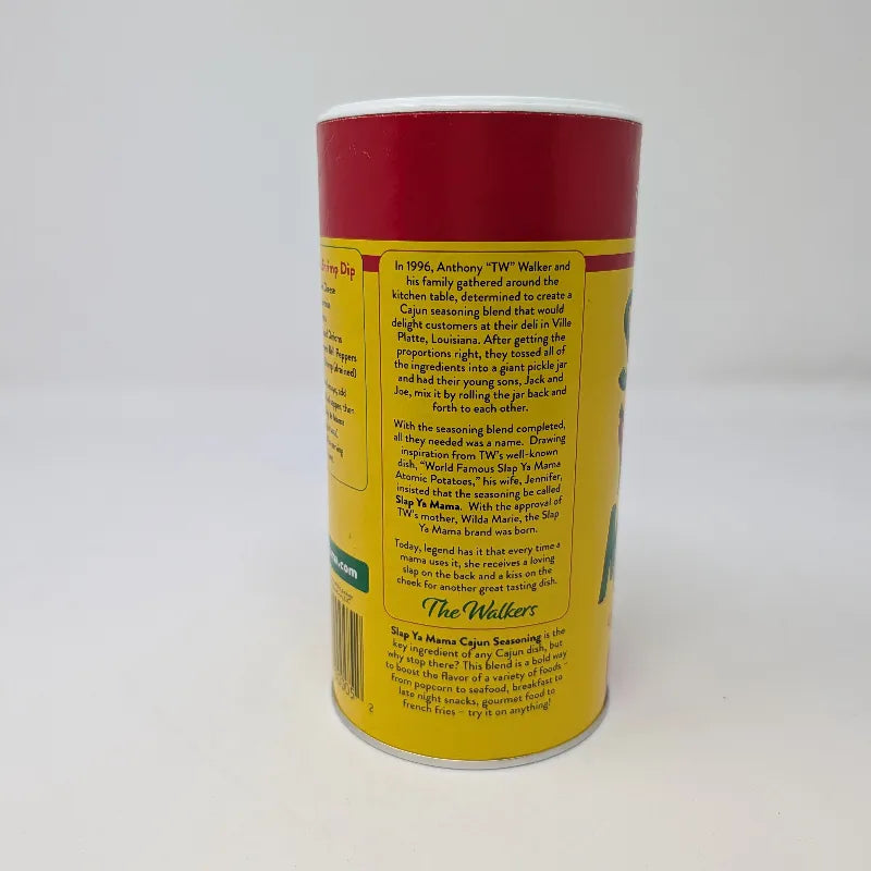 Side view of a 16 ounce shaker container of Slap Ya Mama seasoning featuring red and yellow label on a white background.
