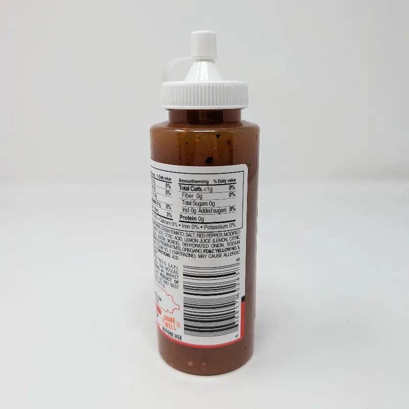 Rear view of a bottle of Zaaschila Habanero Homestyle Hot Sauce on a plain white background featuring Nutrition Facts and ingredients. The bottle has a white cap with a built-in  loop, and features a label with red, white, and black colors showing peppers and a bowl of sauce.